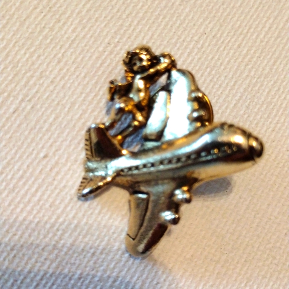 Camco Angel on airplane winglapel pin brooch